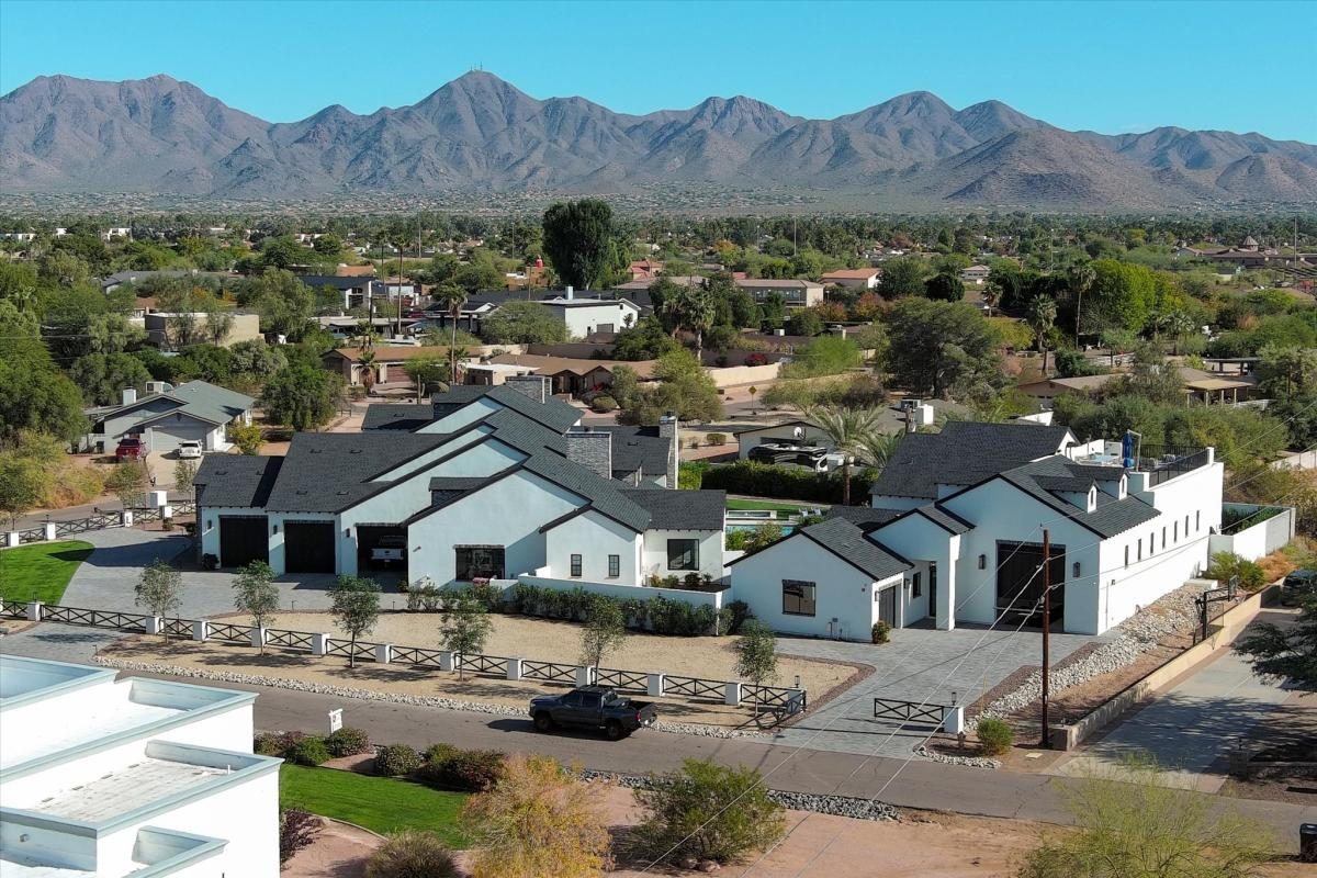 Aerial of a Bel Aire home with Camelback Mountain beyond