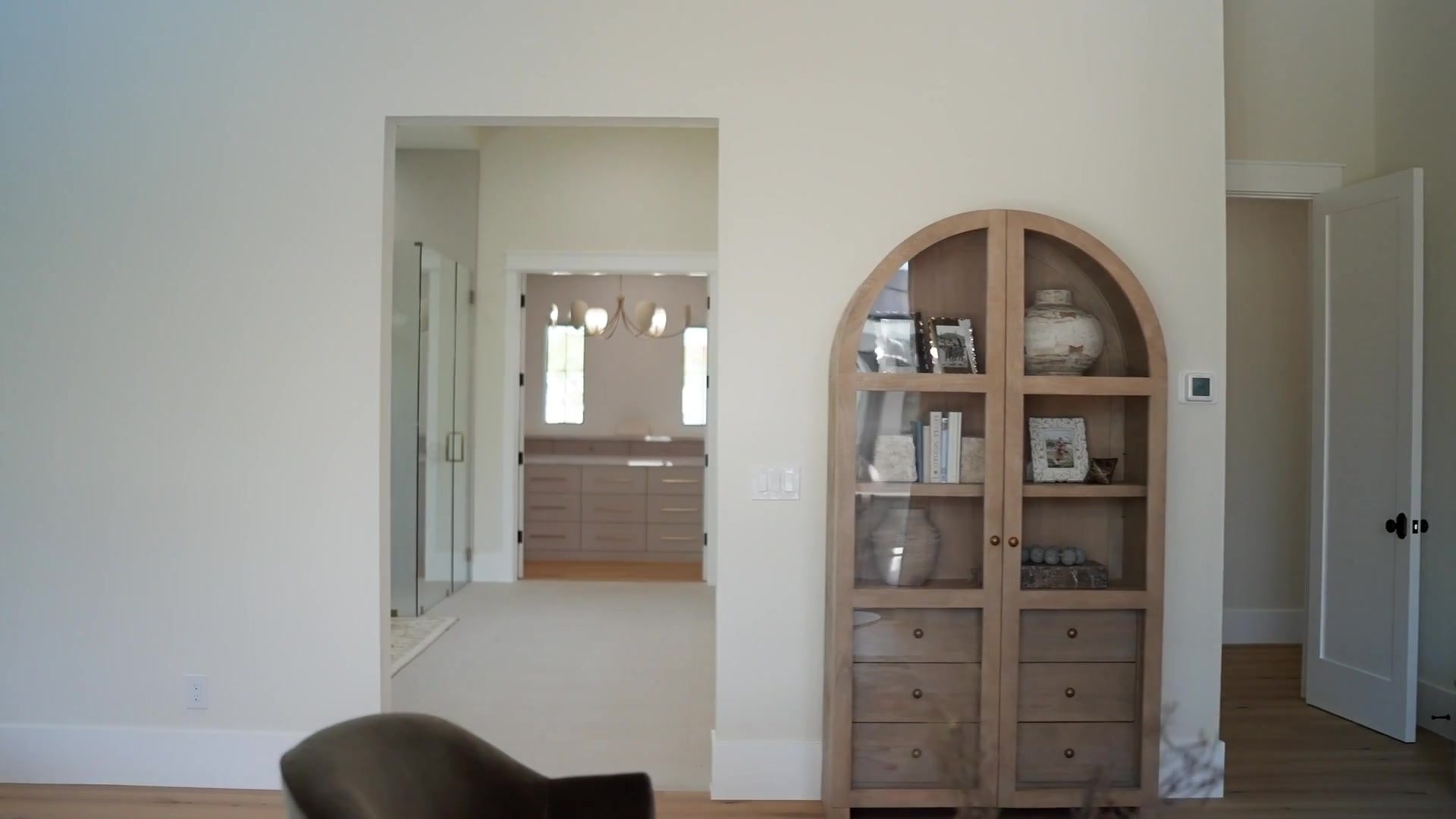 Arched built-ins and white oak millwork