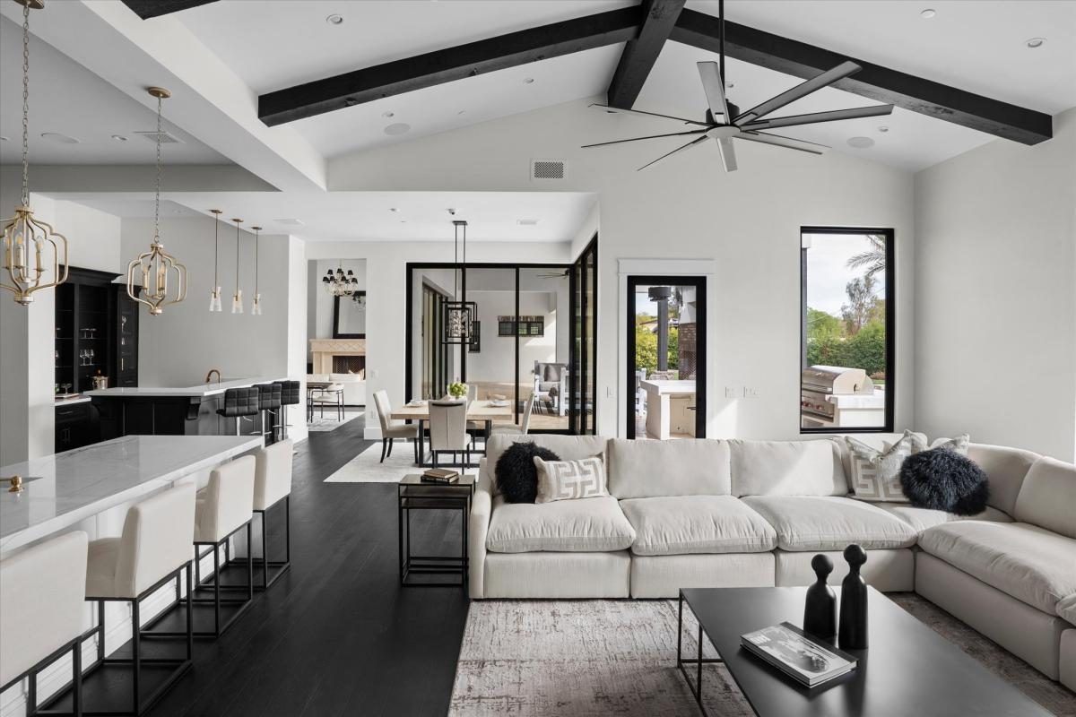 Great room with beams, built by Bel Aire