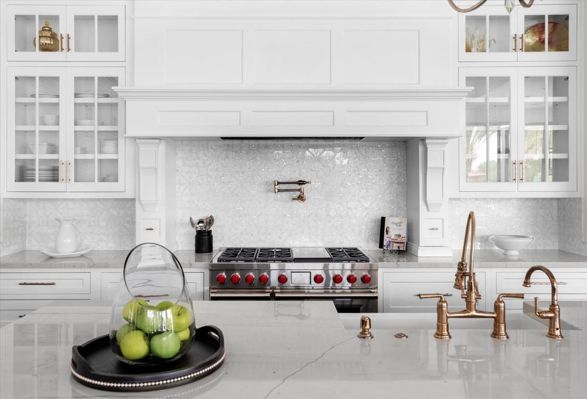 Pro range and brass fixtures, built by Bel Aire