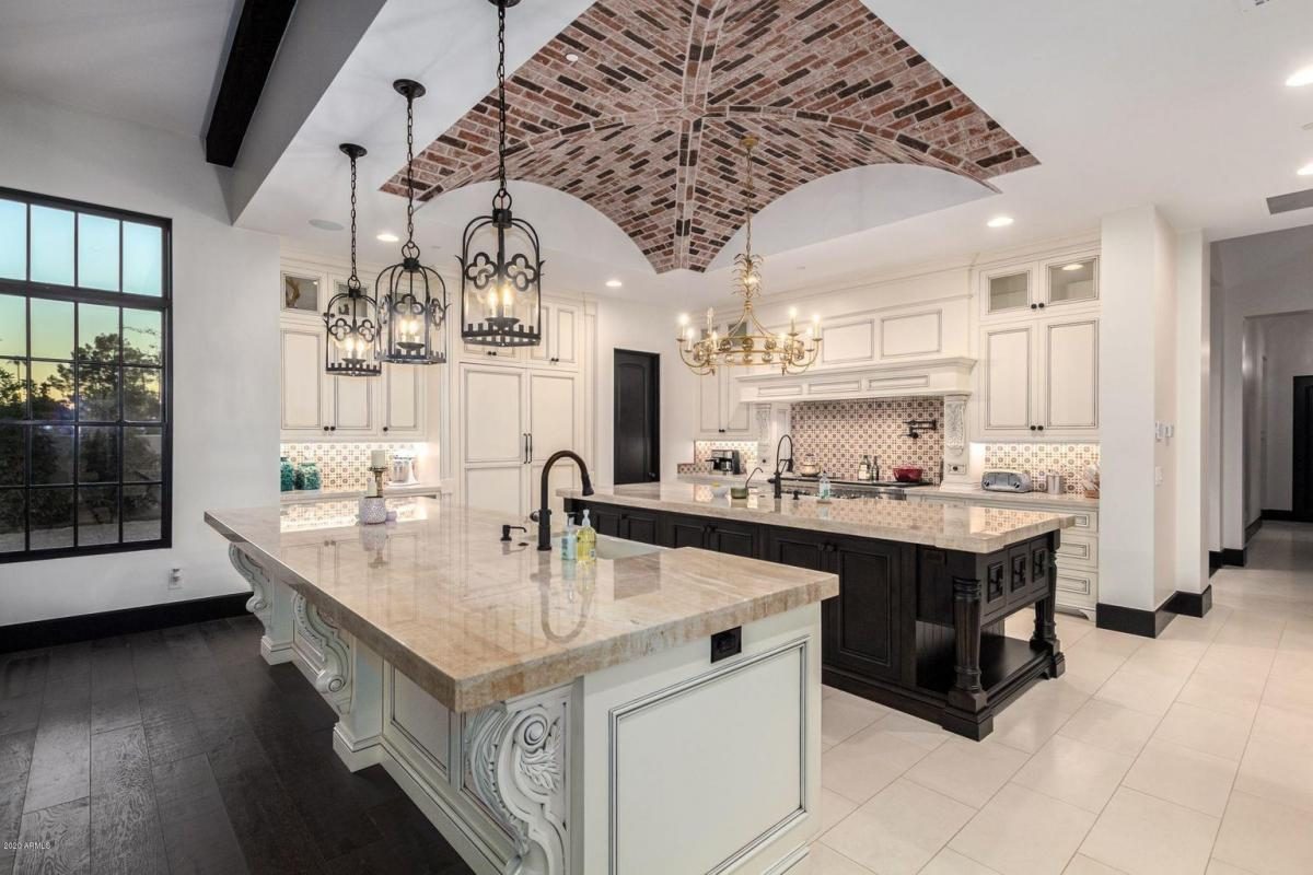Vaulted brick ceilings over a chef's kitchen