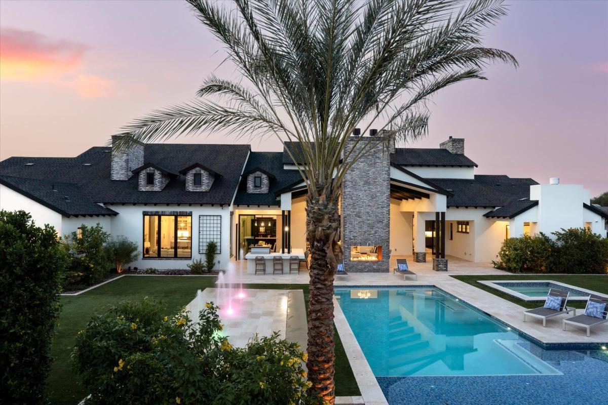 Bel Aire modern farmhouse pool at dusk